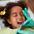 Do dentists clean children's teeth?
